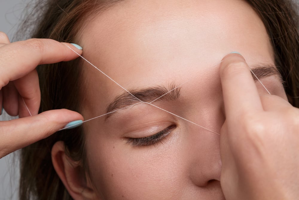 Eyebrow Correction with a White Thread